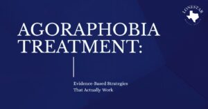 A navy blue graphic with subtle geometric overlays. The title "AGORAPHOBIA TREATMENT:" is written in large white serif font, followed by the subtitle "Evidence-Based Strategies That Actually Work." The Lonestar Mental Health logo is in the top right corner.